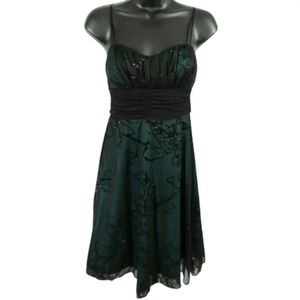 Emerald green dress with black flower pattern and waistline tie + sheer layers